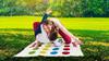Imagen de Toalla Juego Twister en mochila y ruleta impermeable, 100x100cm